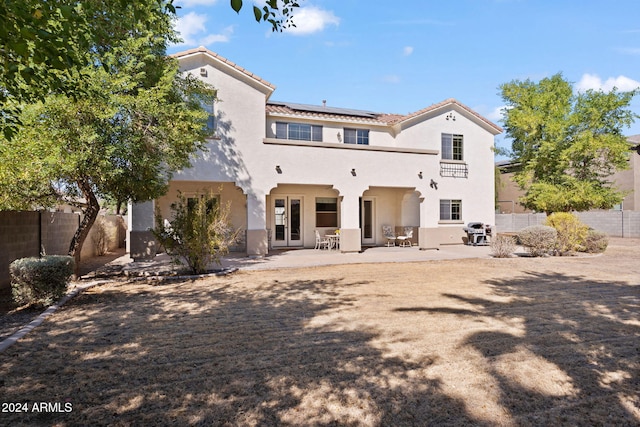 back of house featuring a patio area