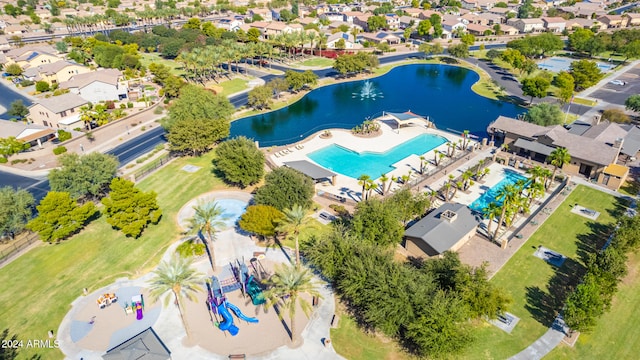 birds eye view of property featuring a water view