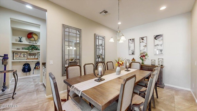 dining room with an inviting chandelier