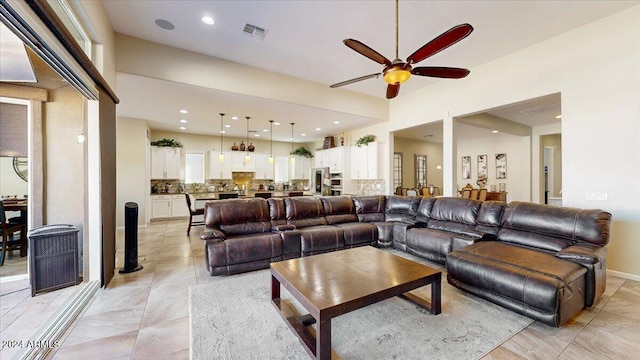 living room with ceiling fan