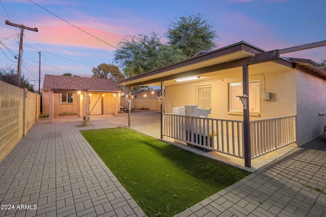 exterior space with a yard and a patio area