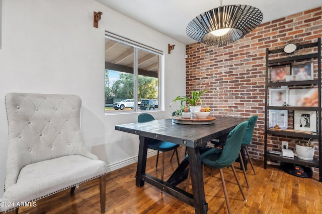 dining room with hardwood / wood-style floors