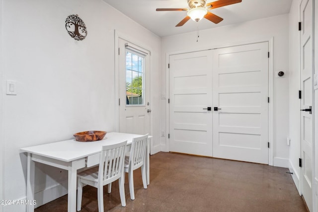 dining space featuring ceiling fan