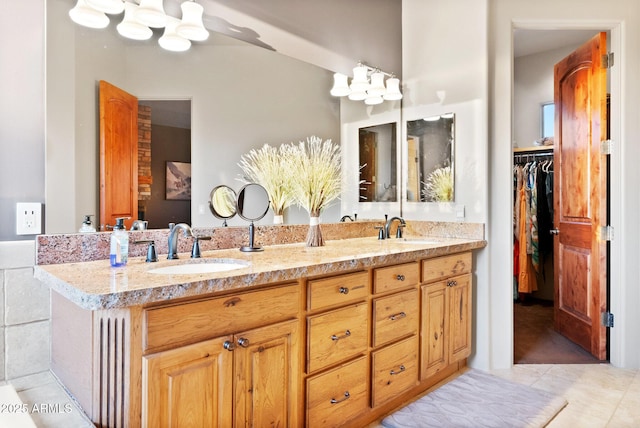 bathroom with vanity and tile patterned flooring