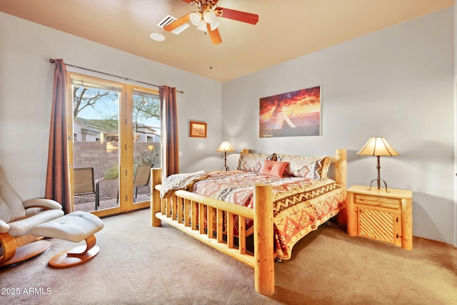 carpeted bedroom featuring access to outside and ceiling fan