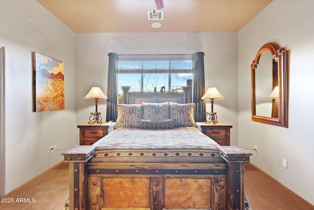 bedroom featuring ceiling fan and carpet flooring