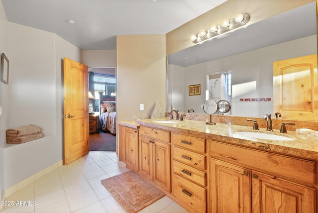 bathroom with vanity and tile patterned floors