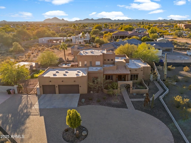 drone / aerial view featuring a mountain view