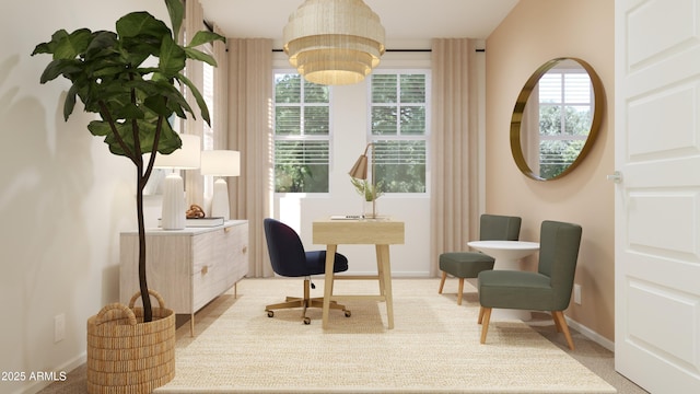 living area featuring baseboards