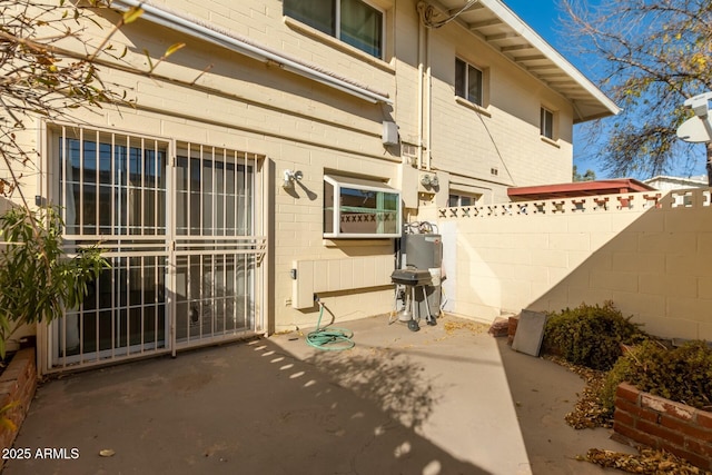 view of patio featuring a grill