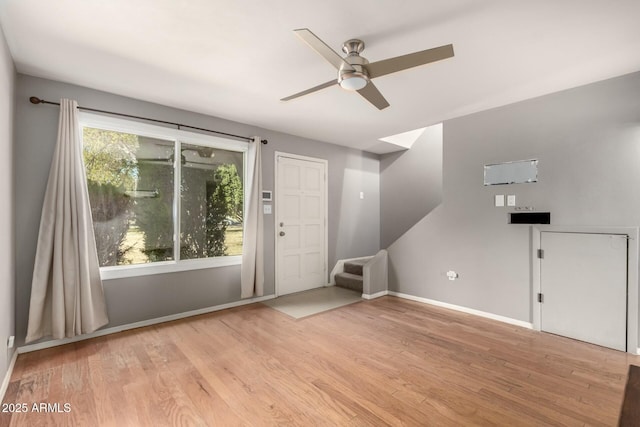 interior space featuring ceiling fan and light hardwood / wood-style floors