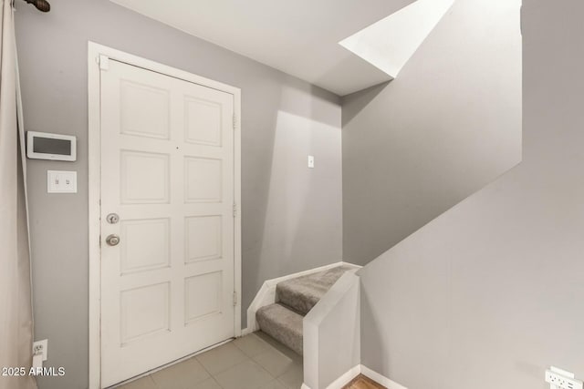 foyer with a skylight