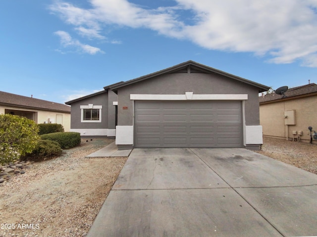 ranch-style house featuring a garage