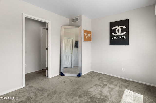 1374 E 10th Pl, Casa Grande, AZ 85122 - unfurnished bedroom featuring carpet floors and baseboards