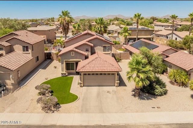 1374 E 10th Pl, Casa Grande, AZ 85122 - aerial perspective of suburban area featuring a mountain backdrop