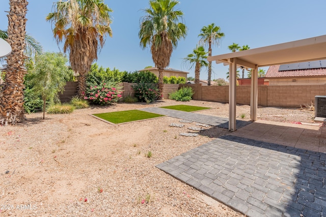 1374 E 10th Pl, Casa Grande, AZ 85122 - fenced backyard featuring a patio area