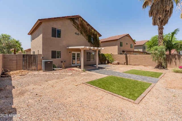 1374 E 10th Pl, Casa Grande, AZ 85122 - rear view of property featuring french doors, a fenced backyard, and a pergola