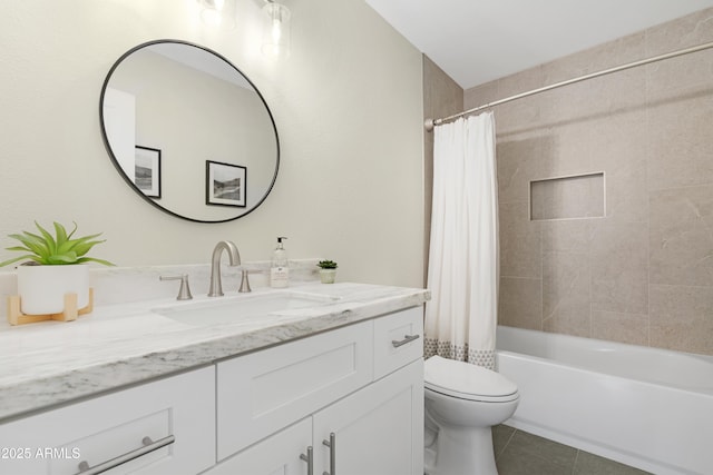 full bathroom with shower / tub combo with curtain, vanity, tile patterned flooring, and toilet