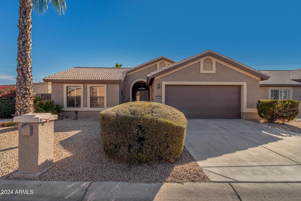 view of front of home featuring a garage