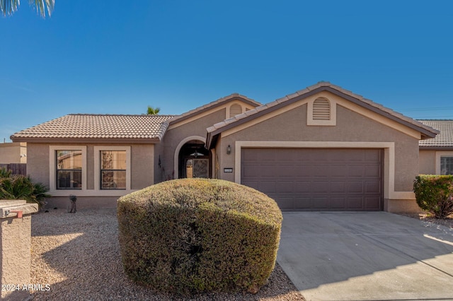 view of front of home with a garage