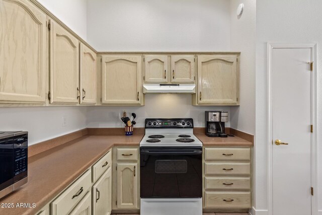 24832 S Boxwood Dr, Sun Lakes, AZ 85248 - kitchen featuring range with electric stovetop, light countertops, stainless steel microwave, light brown cabinetry, and under cabinet range hood