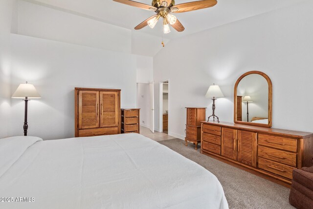 24832 S Boxwood Dr, Sun Lakes, AZ 85248 - carpeted bedroom with ceiling fan, high vaulted ceiling, and baseboards