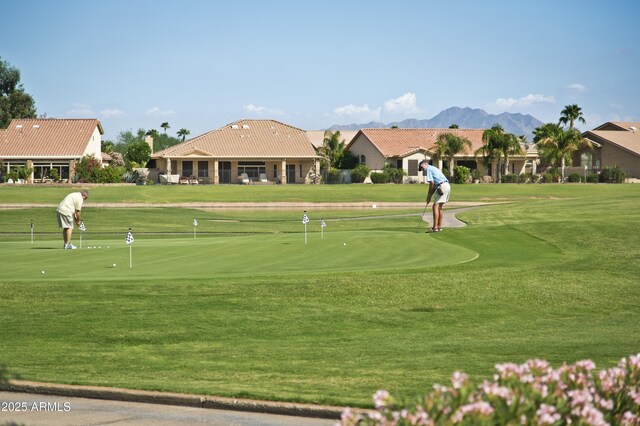 24832 S Boxwood Dr, Sun Lakes, AZ 85248 - view of property's community with a mountain view, golf course view, and a yard