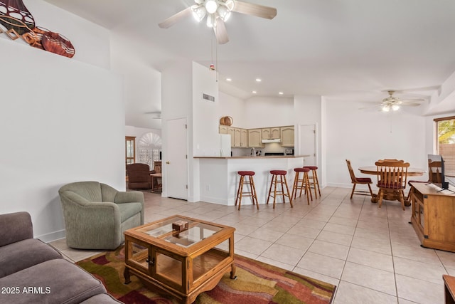 24832 S Boxwood Dr, Sun Lakes, AZ 85248 - living area featuring light tile patterned floors, ceiling fan, and baseboards