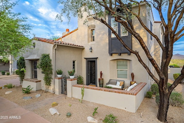 19829 N 97th St, Scottsdale, AZ 85255 - mediterranean / spanish-style home featuring stucco siding, a tiled roof, and outdoor lounge area