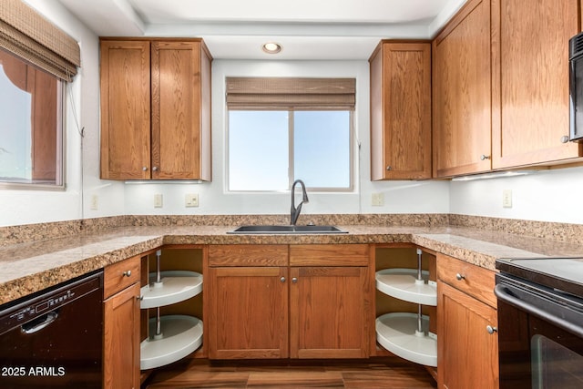13600 N Fountain Hills Blvd Unit 501, Fountain Hills, AZ 85268 - kitchen featuring black appliances, brown cabinets, and dark wood-type flooring