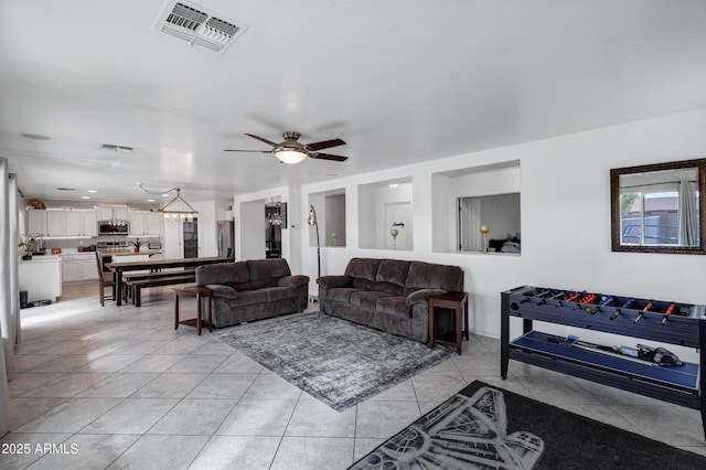 28014 N Jade St, San Tan Valley, AZ 85143 - living room with light tile patterned flooring, visible vents, and a ceiling fan