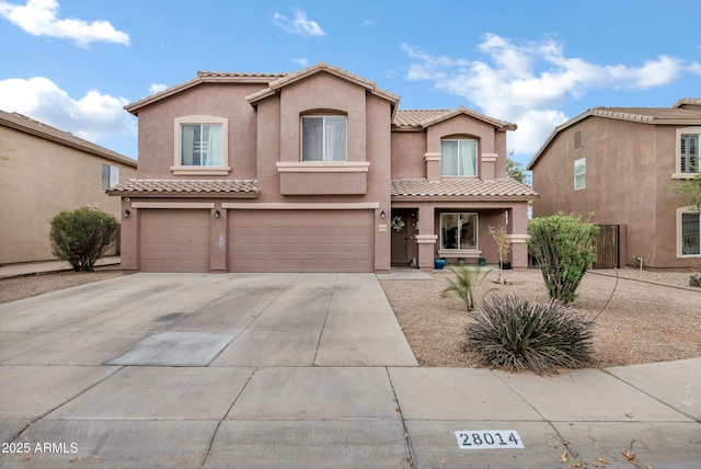 28014 N Jade St, San Tan Valley, AZ 85143 - mediterranean / spanish home featuring stucco siding, a tile roof, a garage, and driveway