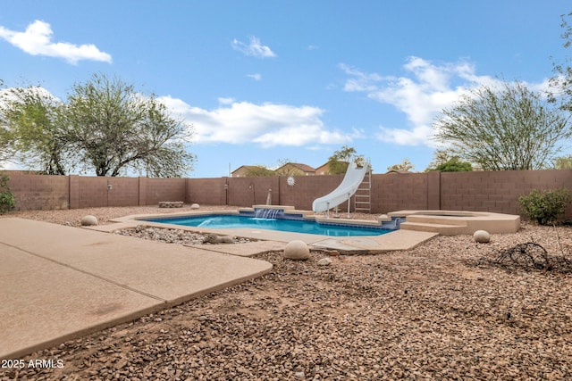 28014 N Jade St, San Tan Valley, AZ 85143 - view of swimming pool featuring an in ground hot tub, a fenced in pool, a water slide, a fenced backyard, and a patio