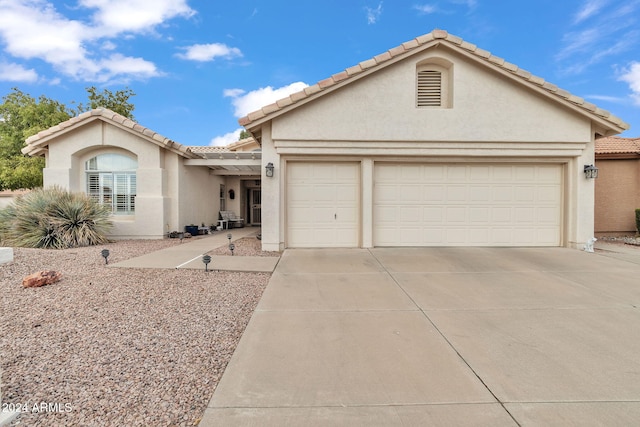 view of front of property with a garage