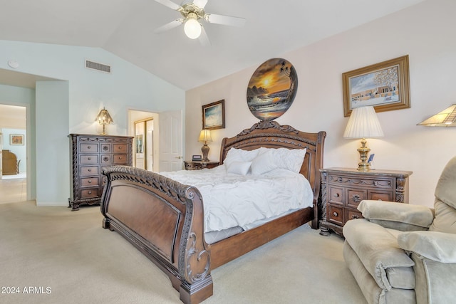 carpeted bedroom with ceiling fan and lofted ceiling