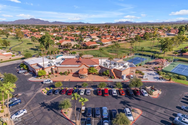 birds eye view of property with a mountain view