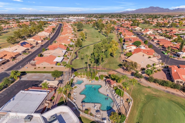 birds eye view of property featuring a mountain view