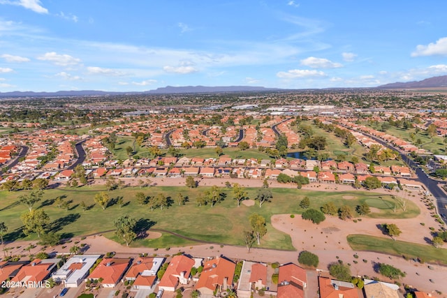 birds eye view of property featuring a mountain view