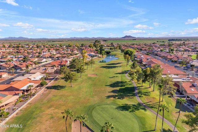 drone / aerial view featuring a water and mountain view