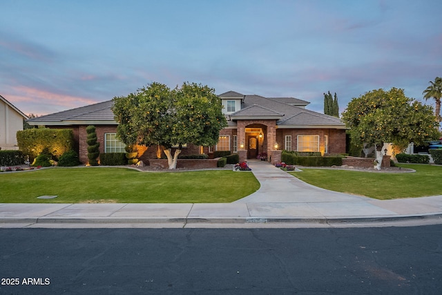 prairie-style house with a yard