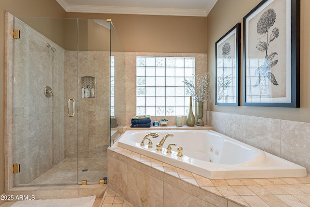 bathroom with crown molding and independent shower and bath