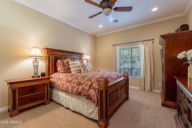 carpeted bedroom featuring ornamental molding and ceiling fan