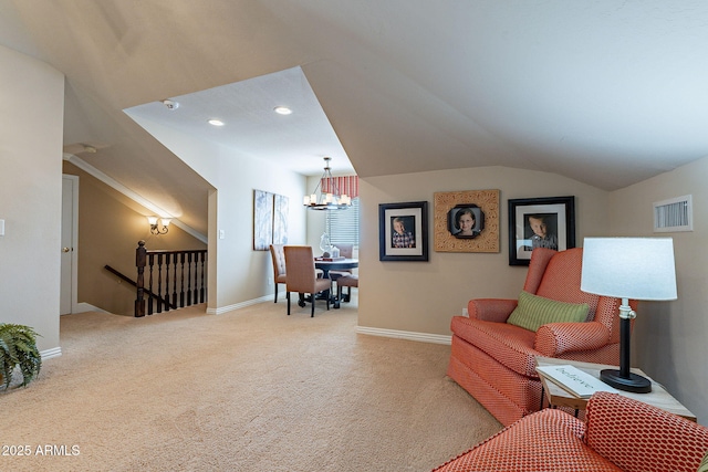 carpeted living room with lofted ceiling and a chandelier