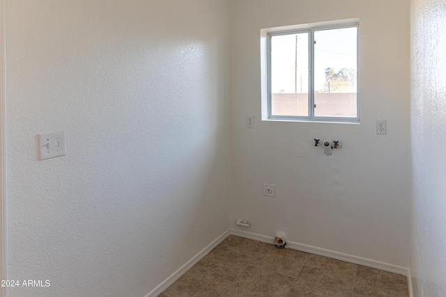 washroom featuring hookup for an electric dryer and washer hookup