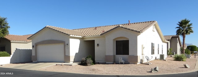 mediterranean / spanish-style house featuring a garage