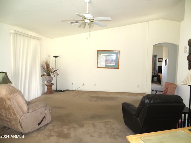 carpeted living room featuring ceiling fan