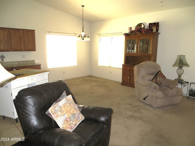 living room with lofted ceiling and light colored carpet