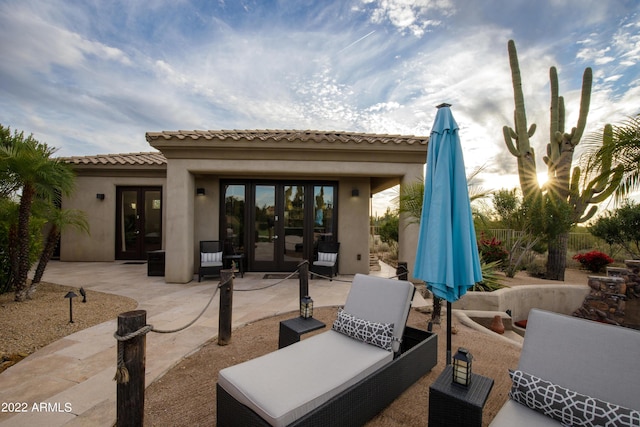 patio terrace at dusk with french doors