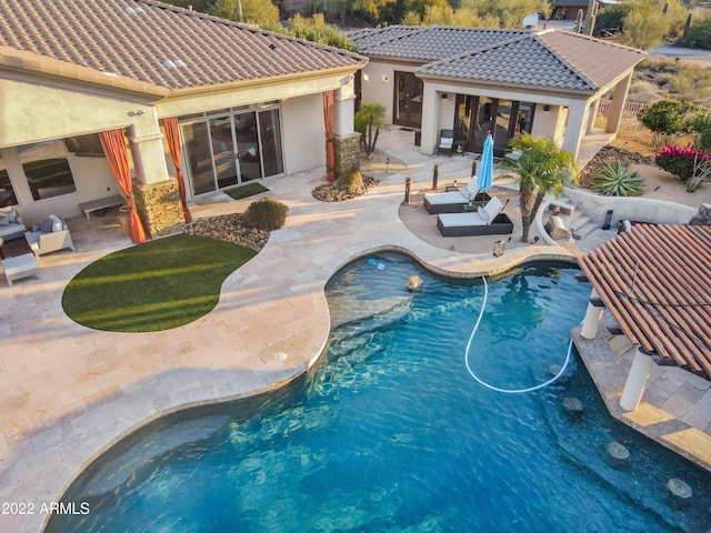 view of pool with a patio