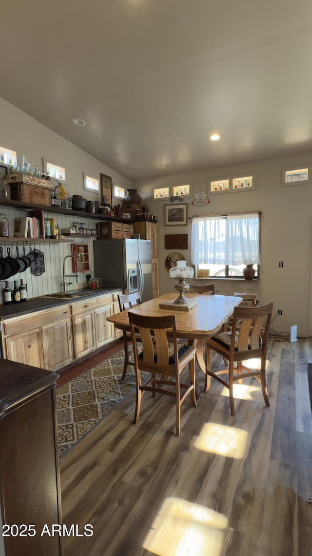 dining room with recessed lighting and wood finished floors